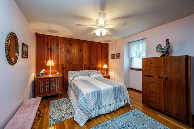 bedroom featuring ceiling fan and hardwood / wood-style floors