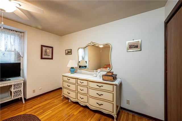 interior space with ceiling fan and light hardwood / wood-style floors