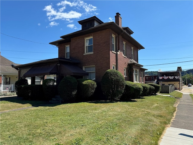 view of property exterior featuring a yard