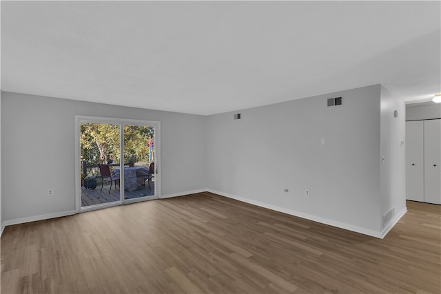 unfurnished room featuring light hardwood / wood-style flooring