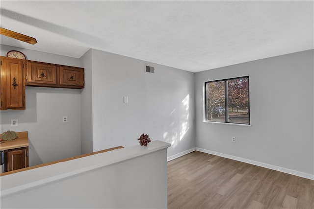 interior space with light hardwood / wood-style flooring