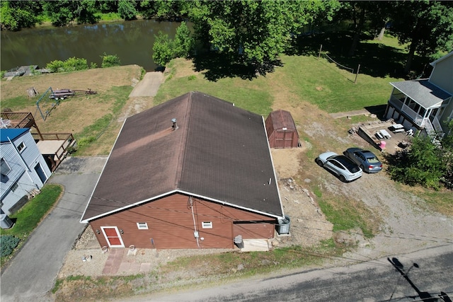 drone / aerial view with a water view