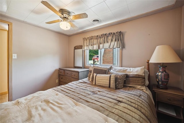 bedroom with visible vents and ceiling fan