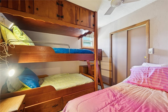 bedroom featuring a closet and a ceiling fan