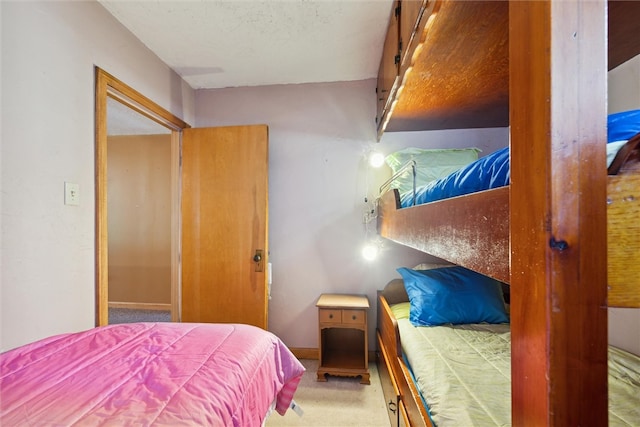 carpeted bedroom featuring a closet