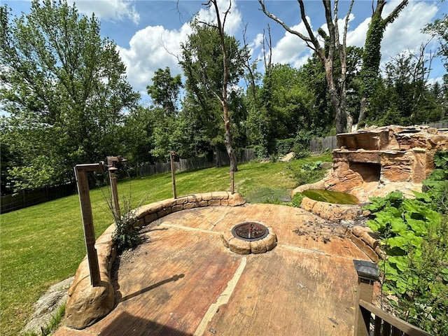 view of patio / terrace featuring a fire pit