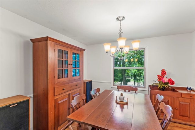 dining room with a chandelier