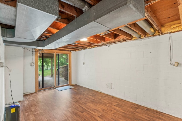 basement featuring hardwood / wood-style flooring