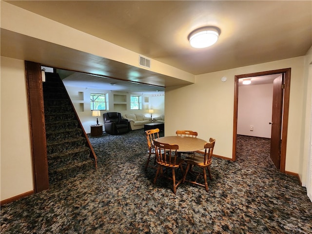 view of carpeted dining space