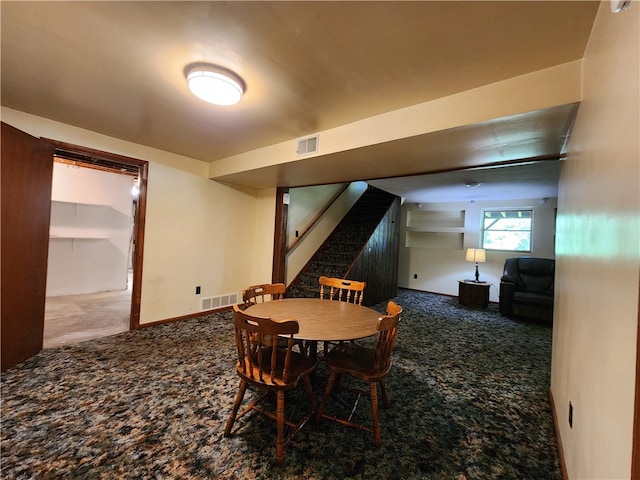 dining room with carpet floors