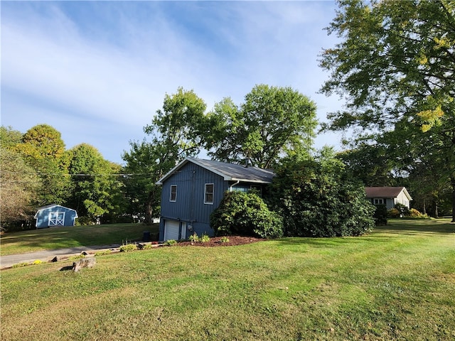 view of yard with a garage