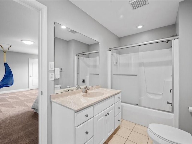 full bathroom with tile patterned flooring, vanity, toilet, and enclosed tub / shower combo