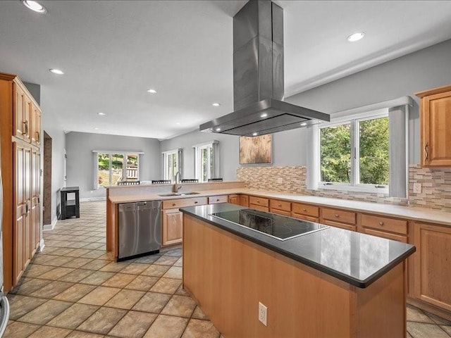 kitchen featuring stainless steel dishwasher, kitchen peninsula, island range hood, black electric stovetop, and a kitchen island