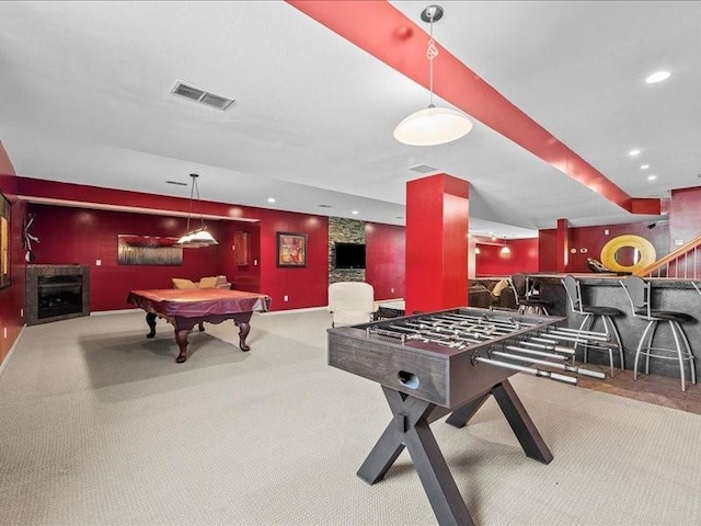 playroom featuring carpet floors, pool table, and bar area