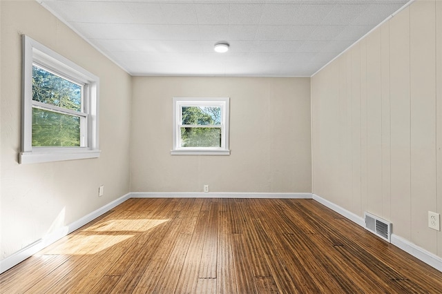 empty room featuring hardwood / wood-style floors