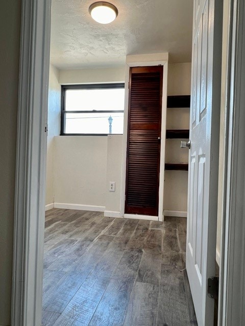 foyer entrance with dark hardwood / wood-style floors