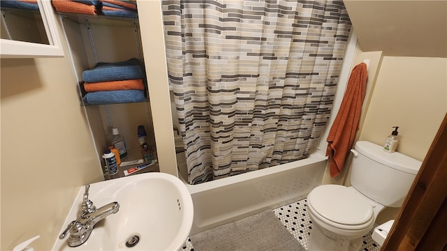 full bathroom featuring shower / tub combo, tile patterned flooring, toilet, and sink