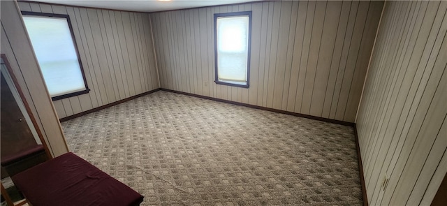 spare room featuring carpet flooring