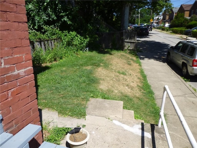 view of yard featuring fence