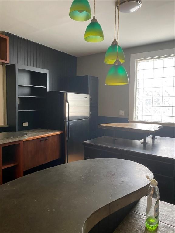 kitchen featuring stainless steel refrigerator