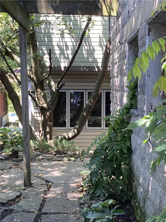 property entrance featuring a patio area