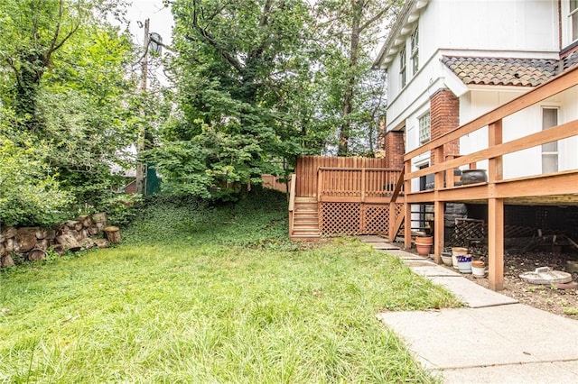 view of yard featuring a deck