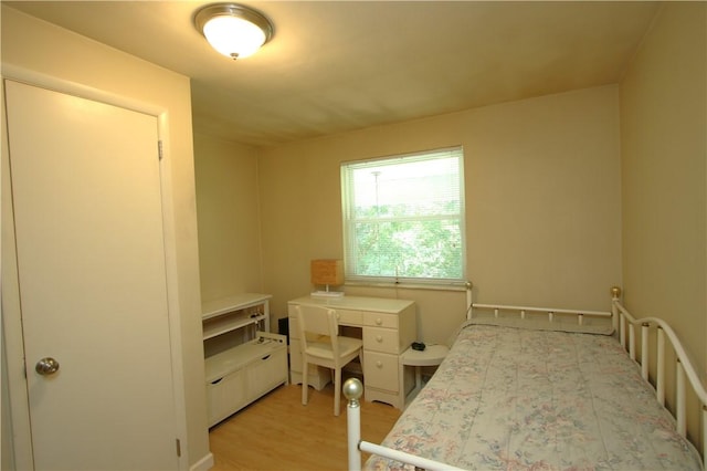 bedroom with light wood-type flooring