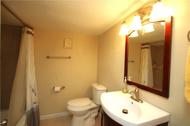 full bathroom featuring toilet, shower / bathtub combination with curtain, tile patterned floors, and vanity