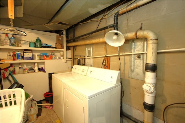 laundry room with washing machine and clothes dryer