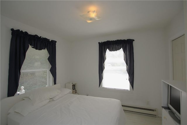 bedroom featuring baseboard heating