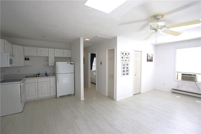 kitchen featuring white cabinets, white appliances, ceiling fan, cooling unit, and a baseboard radiator