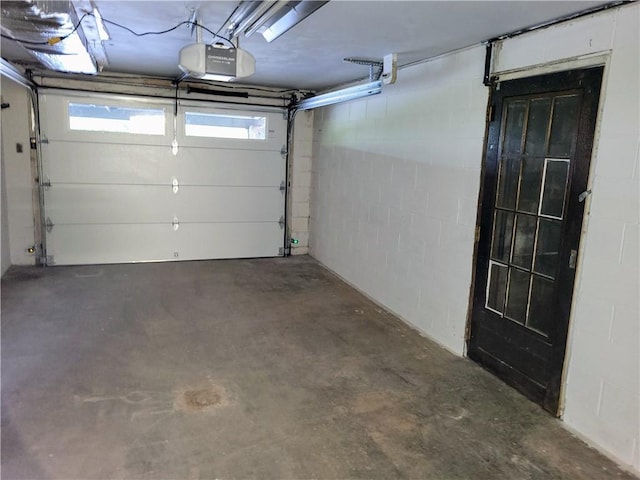 garage featuring a garage door opener