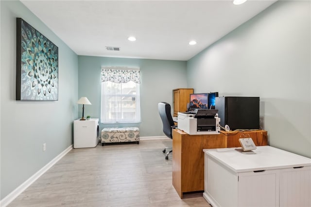 office area featuring light hardwood / wood-style flooring