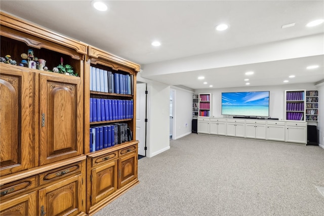 living room featuring light carpet