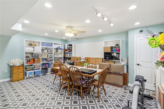 dining area featuring ceiling fan and track lighting