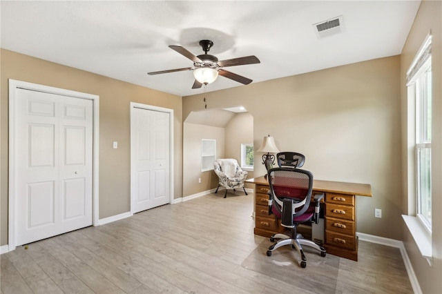 office area featuring light hardwood / wood-style flooring and ceiling fan