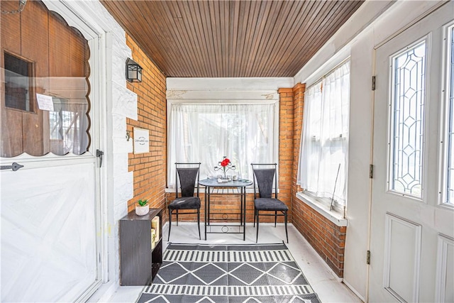 sunroom with wood ceiling