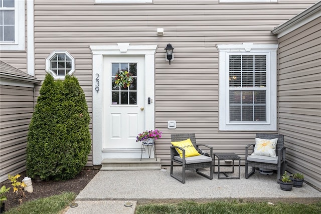 doorway to property with a patio