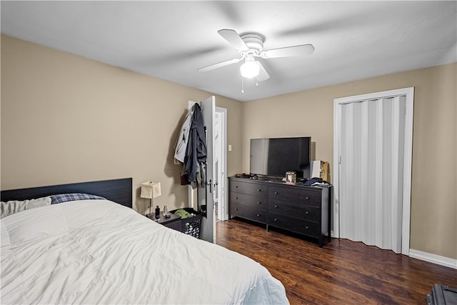 bedroom featuring ceiling fan and dark wood-type flooring