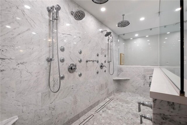 bathroom with tiled shower