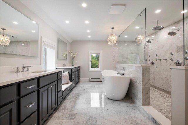 bathroom with vanity, shower with separate bathtub, a notable chandelier, and tile patterned floors