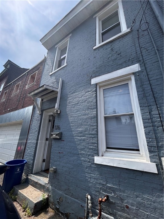 view of home's exterior featuring a garage