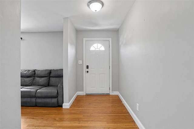 entryway with light hardwood / wood-style floors