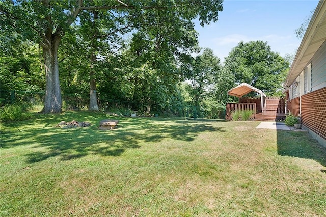 view of yard with a deck