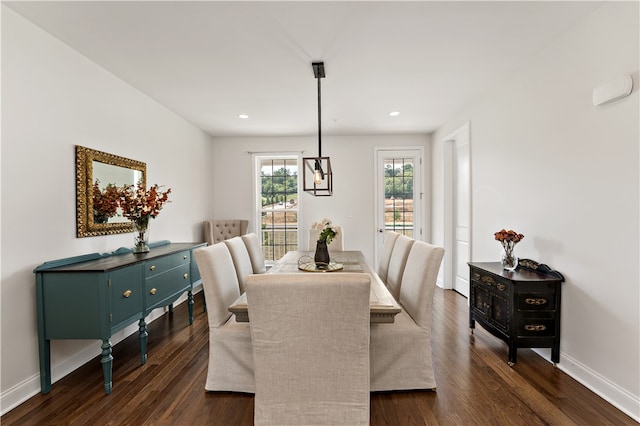 dining area featuring dark hardwood / wood-style floors