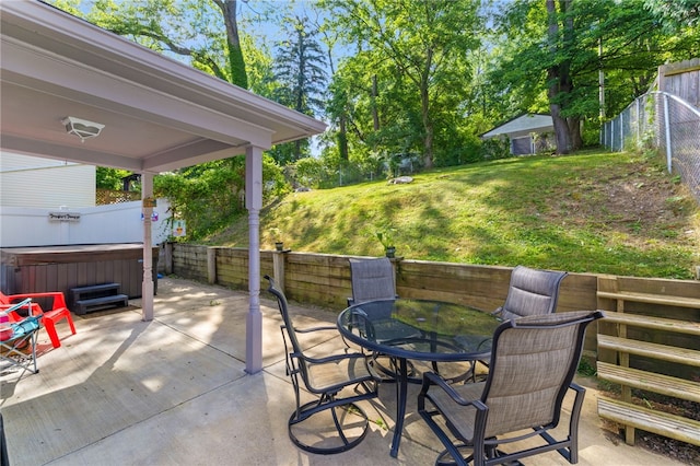 view of patio / terrace featuring a hot tub