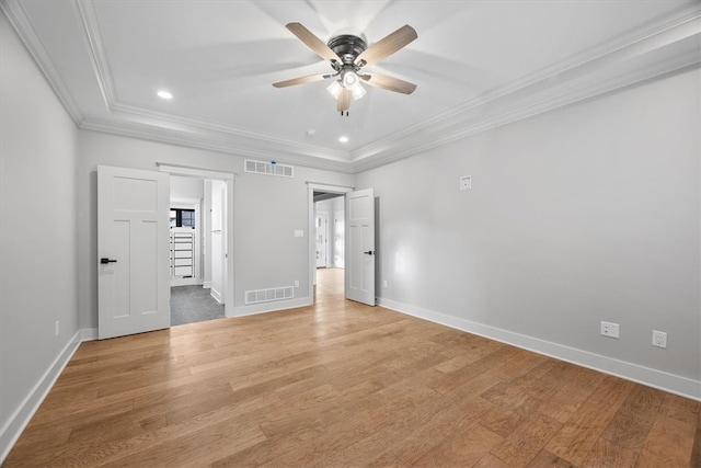 unfurnished bedroom featuring ceiling fan, ornamental molding, and light wood-type flooring