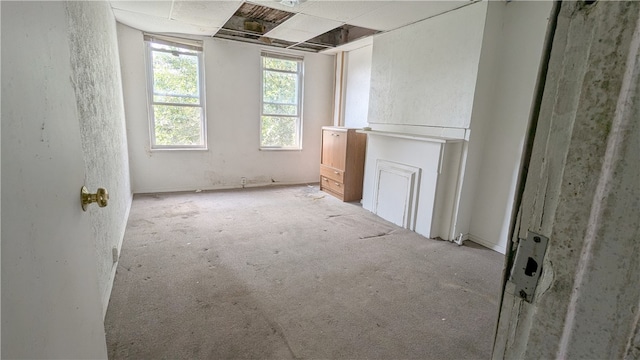 unfurnished living room with carpet floors