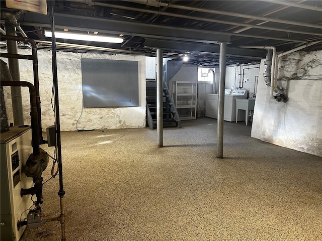 basement featuring separate washer and dryer