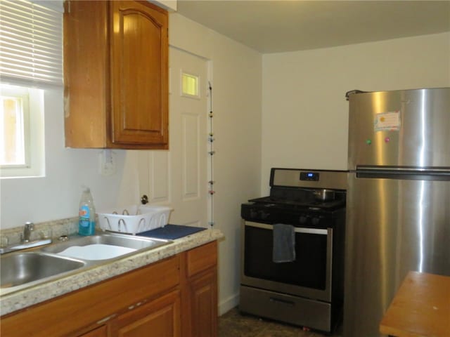 kitchen with appliances with stainless steel finishes and sink